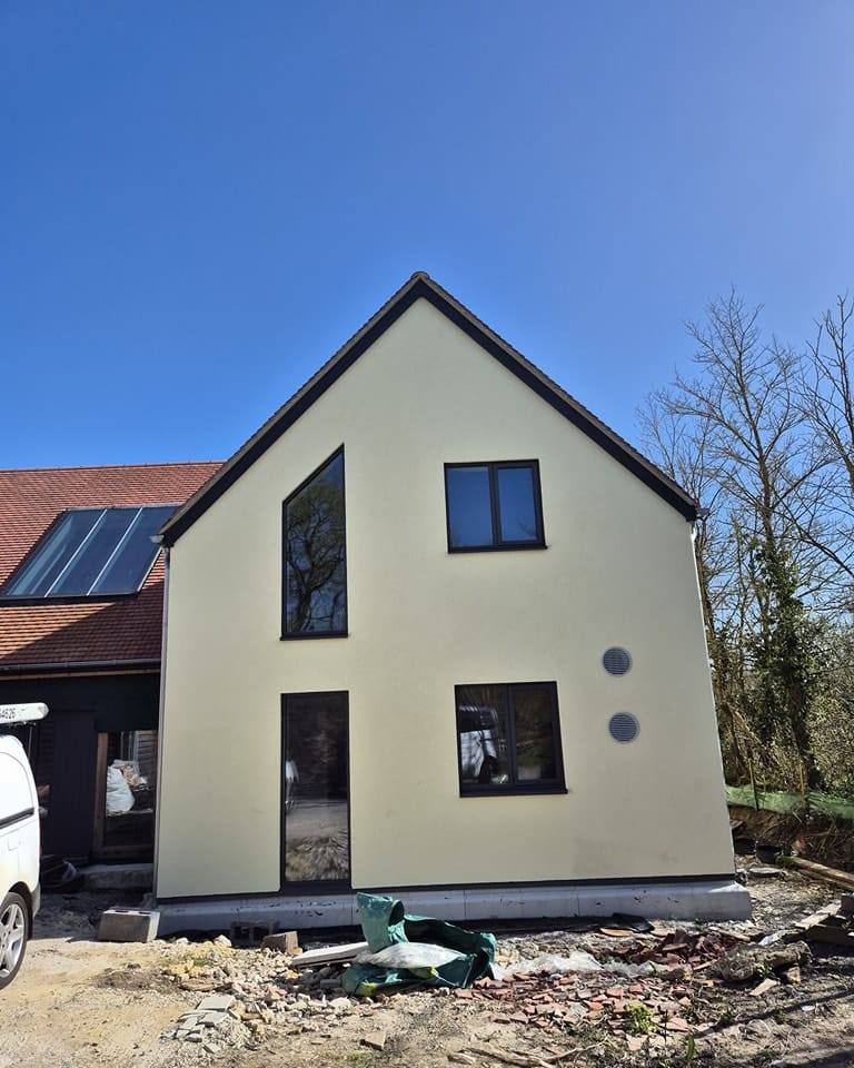 Newly rendered gable end of a house