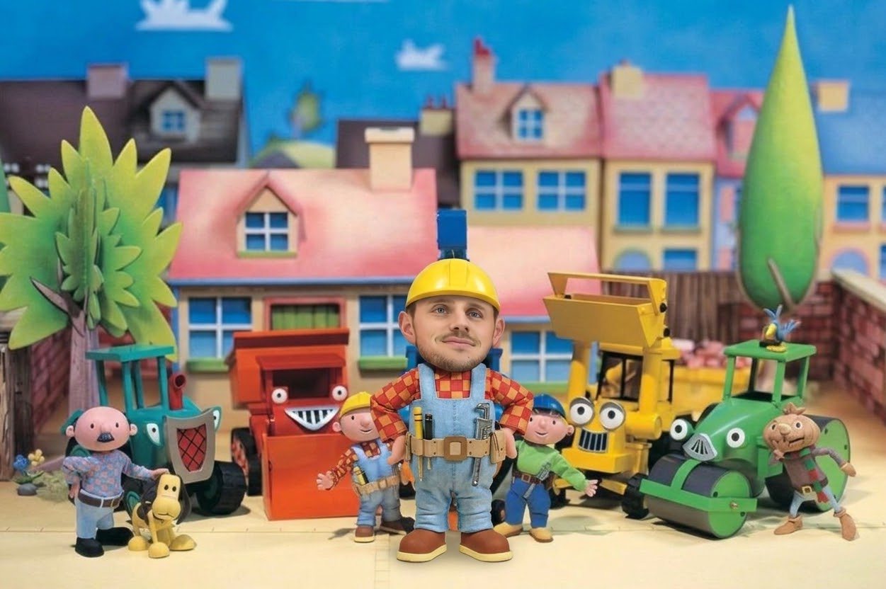 The Hodges Plastering boss in hard hat and tool belt, surrounded by the crew